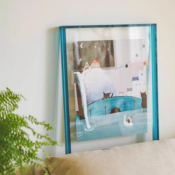 Blue acrylic picture framed artwork of a cartoon scene with a boat and animals on a wall.
