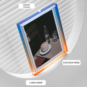 Acrylic ombre picture frame with a blue and orange frame on a white background