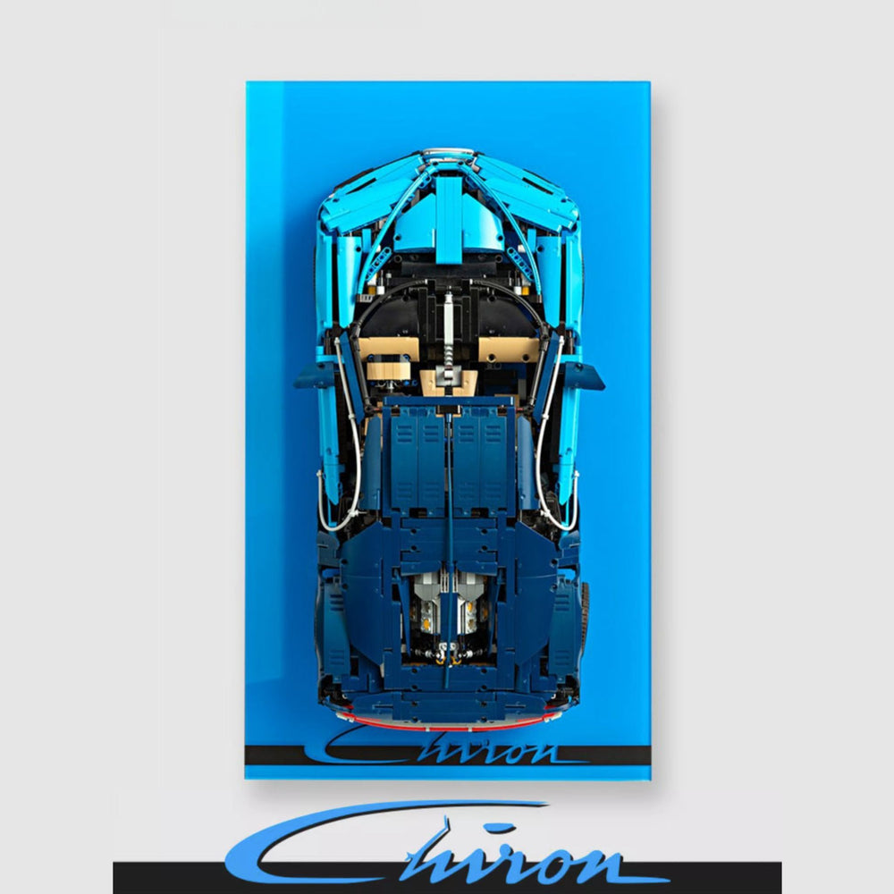 Top-down view of a blue sports car model on a gray background with 'Chiron' branding.