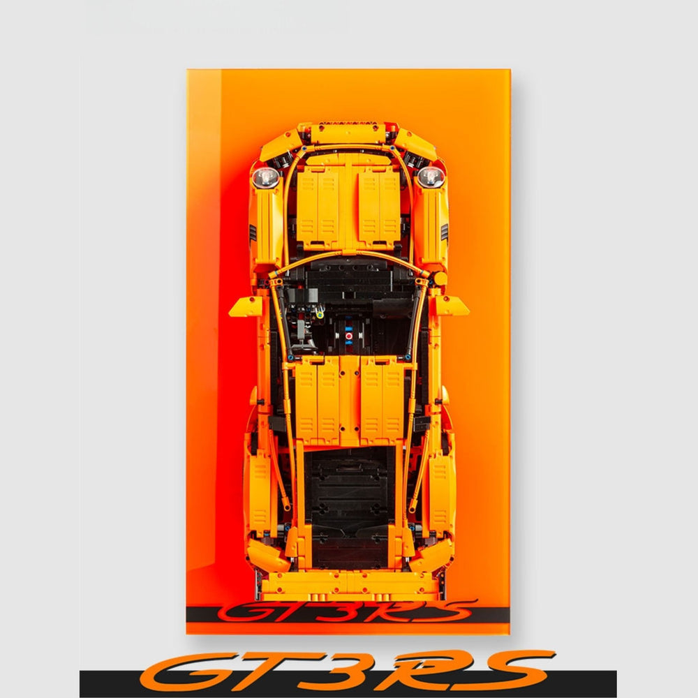LEGO Orange Porsche 911 GT3 RS model car on an orange acrylic wall display