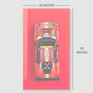 Red ferrari lego hanging on a red wall display with measurements indicated, 16 x 28 inches.