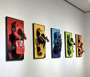 Five LEGO Technic Supercar compatible wall art frames on a white wall.