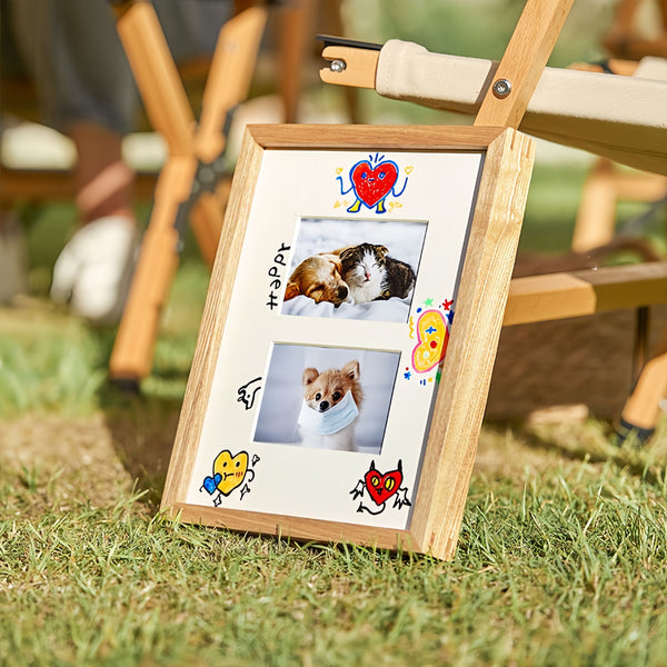 Wooden photo frame with pet pictures on a grassy outdoor setting. White ash wood. 