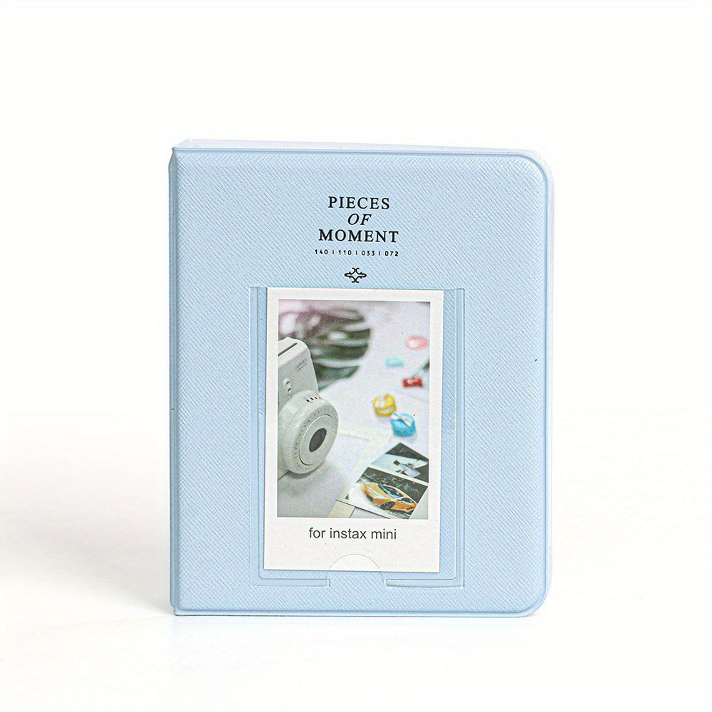 Light blue photo album with a small window displaying a camera and photos on a white background