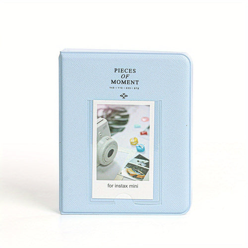 Light blue photo album with a small window displaying a camera and photos on a white background